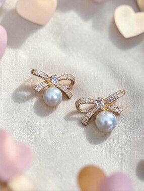 Goldtone Bow Pearl Stud Earrings